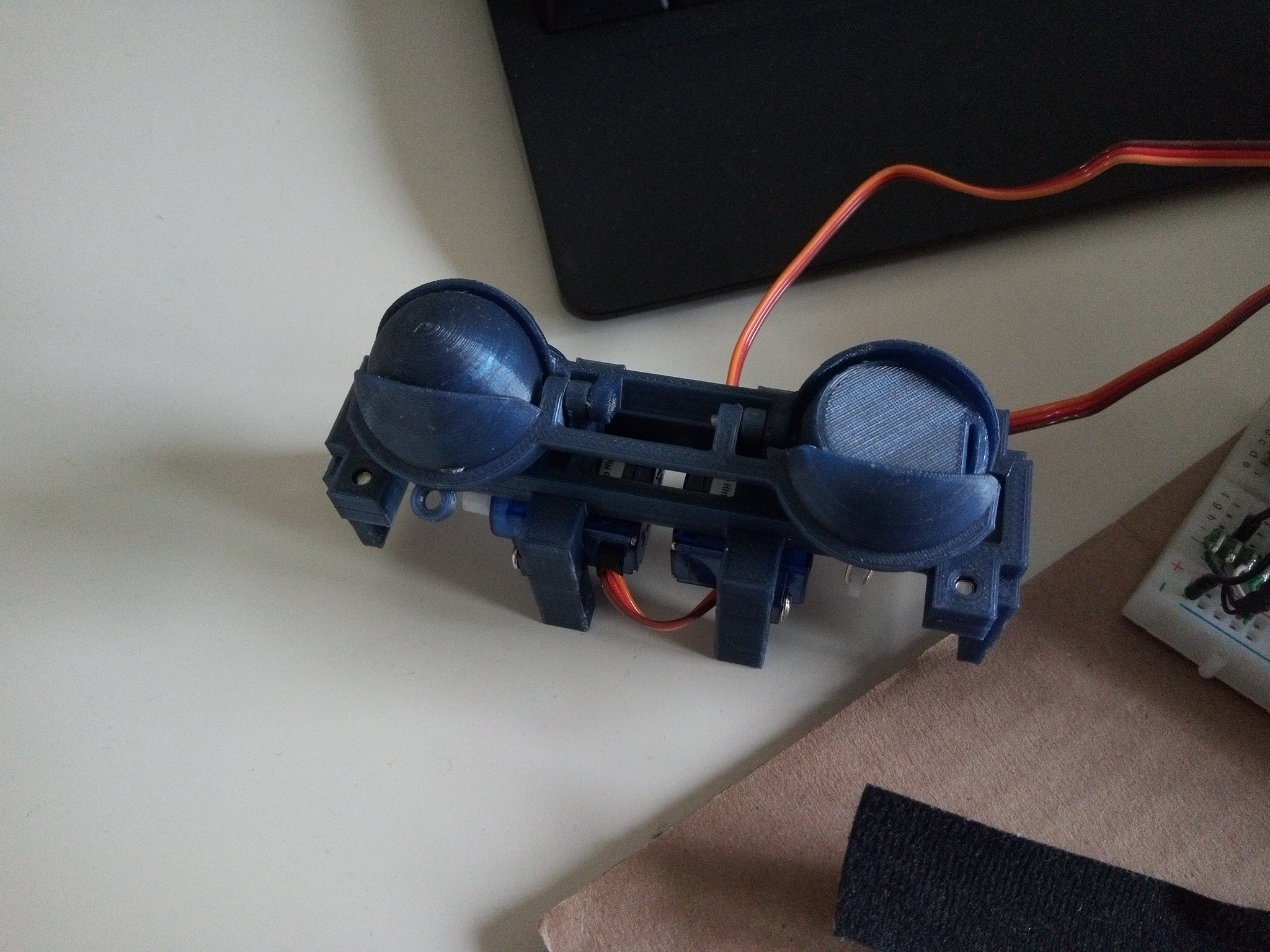 The assembled eye mechanism, printed with dark blue PETG